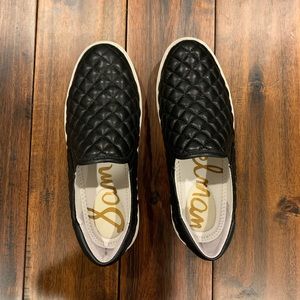 Black quilted leather slip-on sneakers
